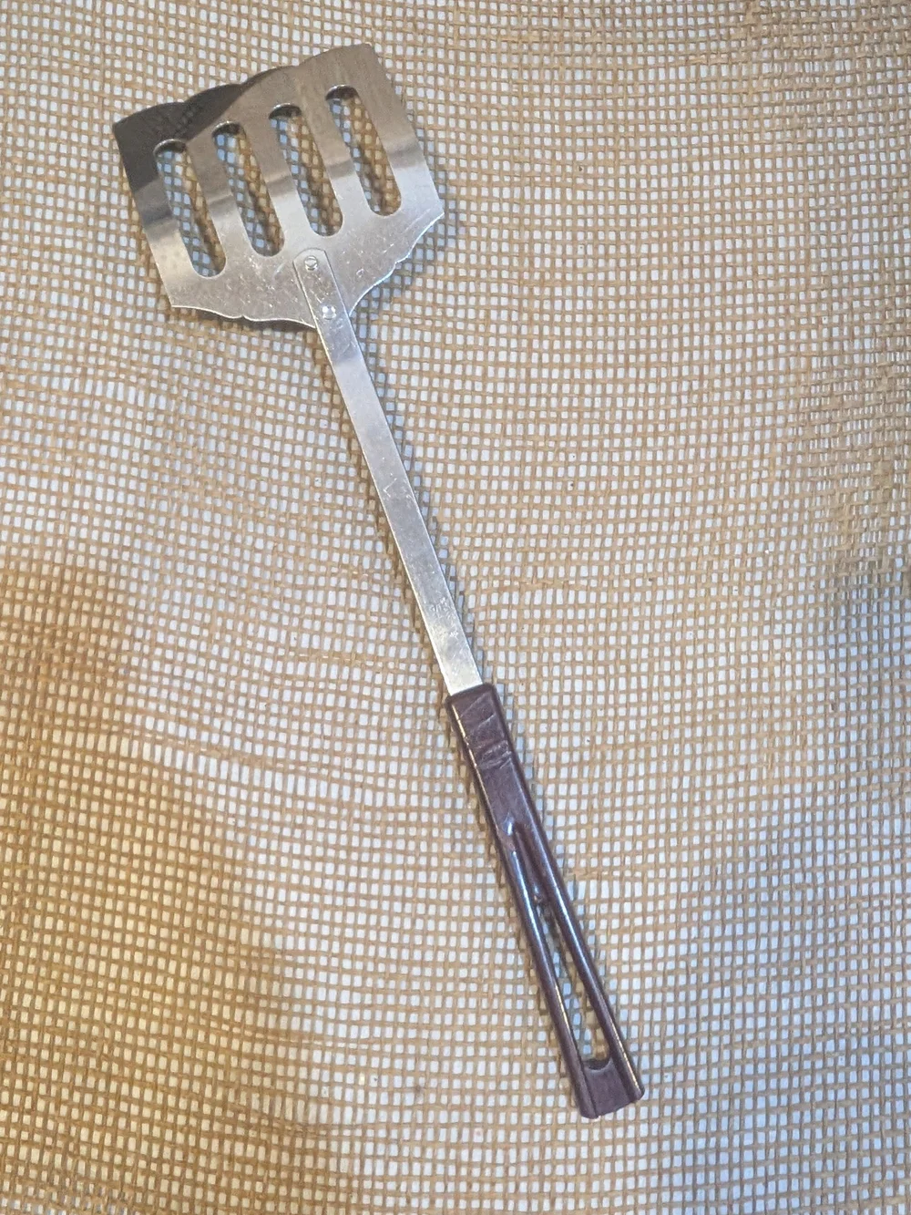 Vintage Stanhome Slotted Metal Turner with Marbled Brown Handle